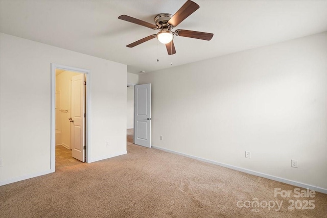 2515 Walnut Forest Dr, Charlotte, NC 28216 - unfurnished bedroom featuring light colored carpet, baseboards, and a ceiling fan