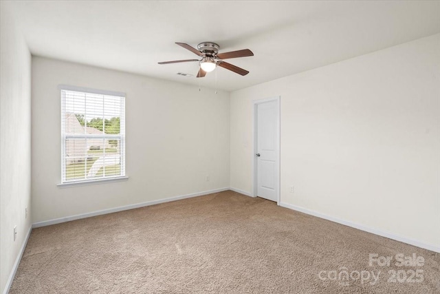 2515 Walnut Forest Dr, Charlotte, NC 28216 - carpeted empty room with a ceiling fan and baseboards