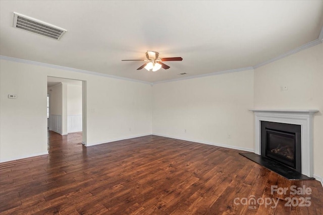 2515 Walnut Forest Dr, Charlotte, NC 28216 - unfurnished living room featuring a ceiling fan, dark wood-style floors, ornamental molding, and a glass covered fireplace