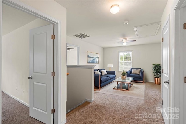 2515 Walnut Forest Dr, Charlotte, NC 28216 - living area with attic access, carpet floors, and a ceiling fan