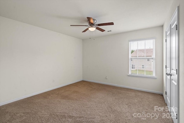 2515 Walnut Forest Dr, Charlotte, NC 28216 - empty room with carpet and ceiling fan