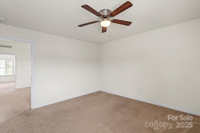 2515 Walnut Forest Dr, Charlotte, NC 28216 - carpeted empty room featuring a ceiling fan and a smoke detector
