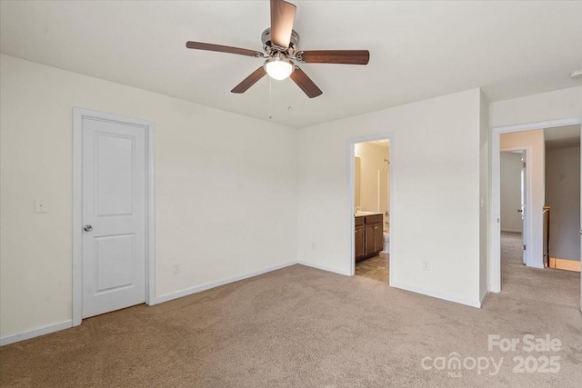 2515 Walnut Forest Dr, Charlotte, NC 28216 - unfurnished bedroom featuring light colored carpet, ensuite bath, and a ceiling fan