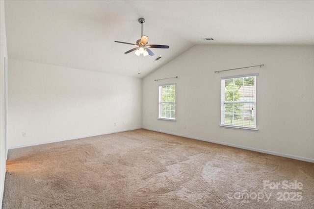 2515 Walnut Forest Dr, Charlotte, NC 28216 - carpeted empty room featuring ceiling fan and lofted ceiling