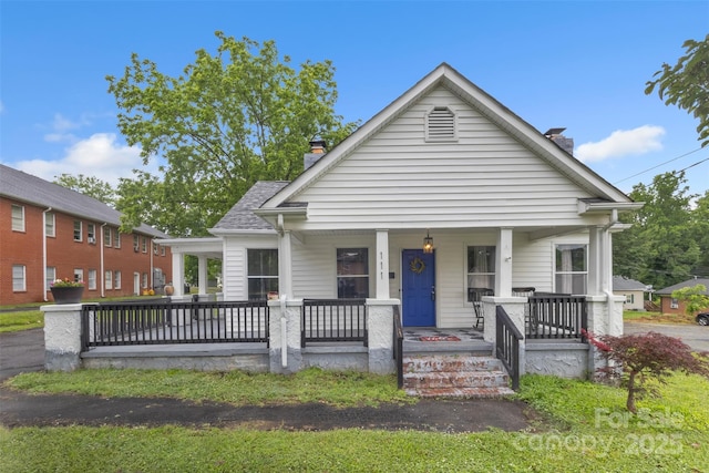 111 E Church St, Stanley, NC 28164 - bungalow-style house featuring a chimney and covered porch