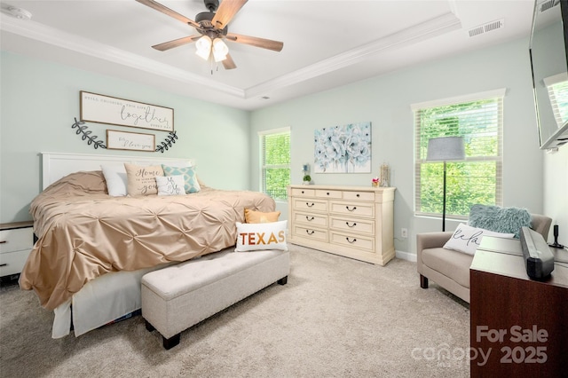 7530 Porrera St, Charlotte, NC 28214 - bedroom featuring ornamental molding, a raised ceiling, light colored carpet, multiple windows, and ceiling fan