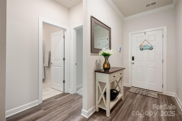7530 Porrera St, Charlotte, NC 28214 - foyer entrance with wood finished floors and ornamental molding