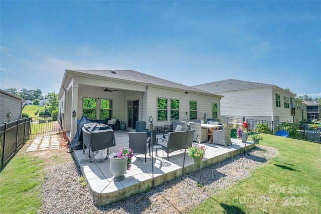 7530 Porrera St, Charlotte, NC 28214 - back of house featuring a ceiling fan, a fenced backyard, a patio, and outdoor lounge area
