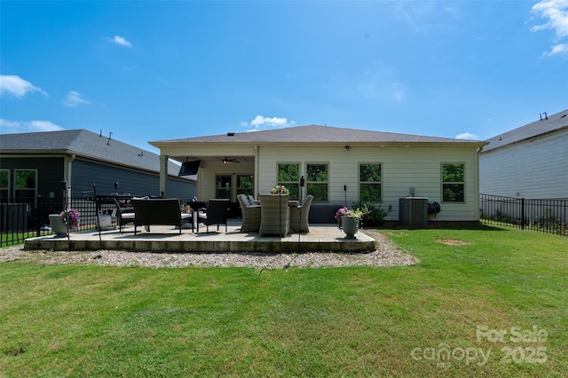 7530 Porrera St, Charlotte, NC 28214 - rear view of house with ceiling fan, a fenced backyard, and a patio area