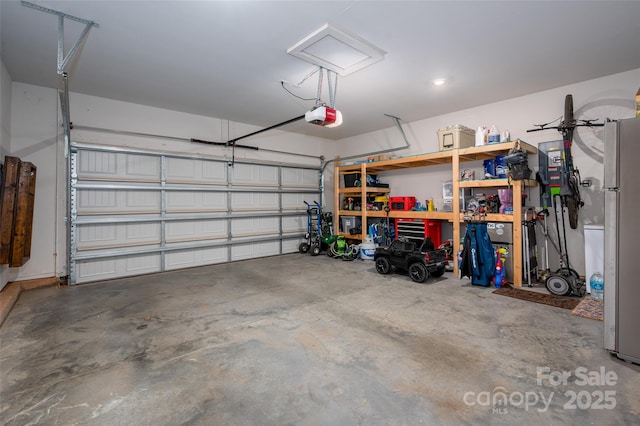 7530 Porrera St, Charlotte, NC 28214 - garage with a garage door opener and freestanding refrigerator