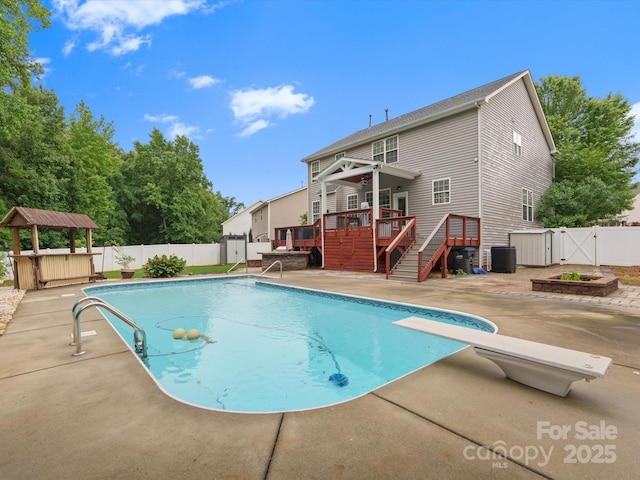 3038 Sterling Ct, Fort Mill, SC 29707 - view of swimming pool with a wooden deck, a fenced backyard, a gate, and a patio area