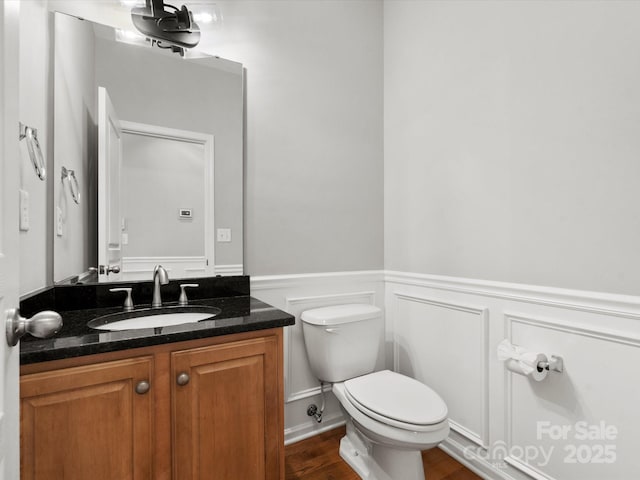 3038 Sterling Ct, Fort Mill, SC 29707 - bathroom with toilet, wainscoting, vanity, wood finished floors, and a decorative wall