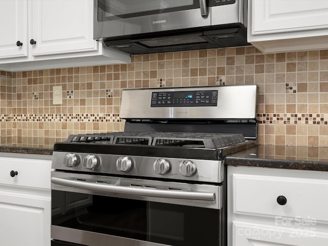 3038 Sterling Ct, Fort Mill, SC 29707 - kitchen with appliances with stainless steel finishes, tasteful backsplash, white cabinetry, and dark stone counters