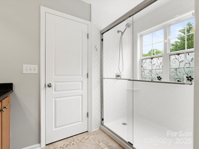 3038 Sterling Ct, Fort Mill, SC 29707 - bathroom with a shower stall, vanity, and tile patterned floors