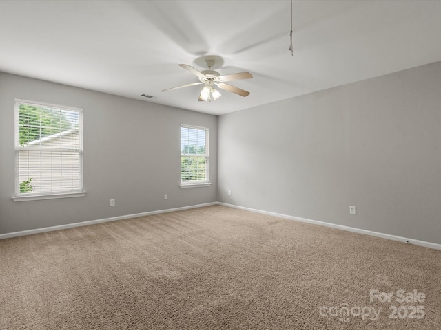 3038 Sterling Ct, Fort Mill, SC 29707 - spare room featuring a ceiling fan, carpet, and baseboards