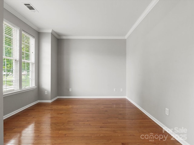 3038 Sterling Ct, Fort Mill, SC 29707 - unfurnished room with wood finished floors, plenty of natural light, crown molding, and baseboards