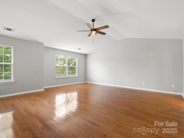 3038 Sterling Ct, Fort Mill, SC 29707 - unfurnished room with a ceiling fan, vaulted ceiling, wood finished floors, and baseboards
