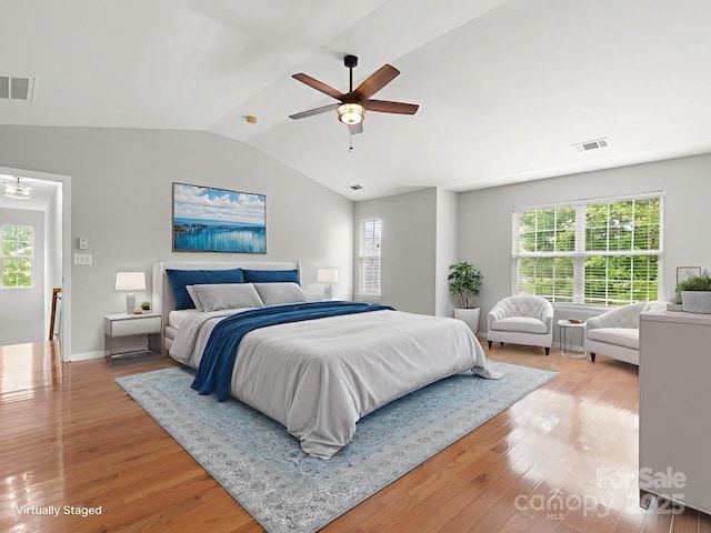 3038 Sterling Ct, Fort Mill, SC 29707 - bedroom with light wood-style floors, vaulted ceiling, multiple windows, and ceiling fan