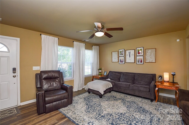 4075 Clover Rd NW, Concord, NC 28027 - living room featuring dark wood finished floors, a ceiling fan, and baseboards