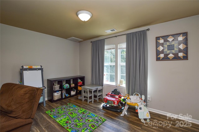 4075 Clover Rd NW, Concord, NC 28027 - rec room with wood finished floors and baseboards