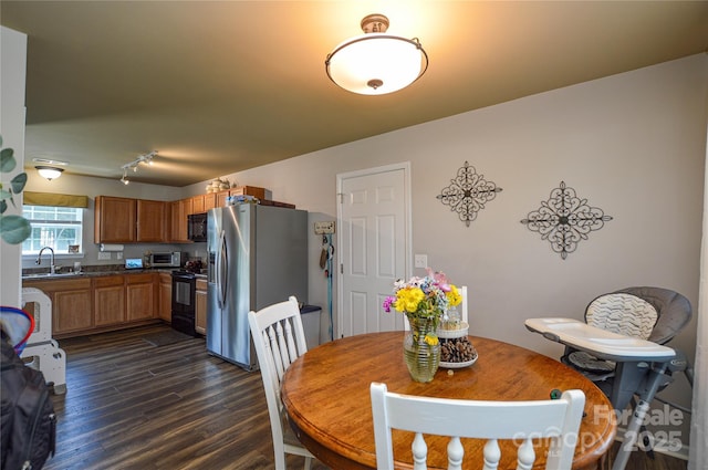 4075 Clover Rd NW, Concord, NC 28027 - dining room featuring dark wood-style flooring