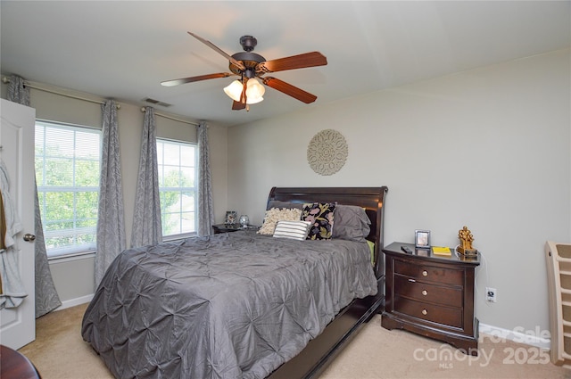 4075 Clover Rd NW, Concord, NC 28027 - bedroom featuring light carpet, ceiling fan, and baseboards