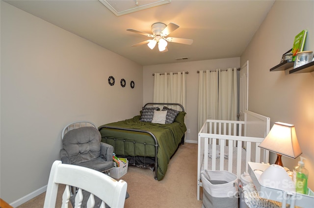 4075 Clover Rd NW, Concord, NC 28027 - carpeted bedroom with baseboards, a ceiling fan, and attic access