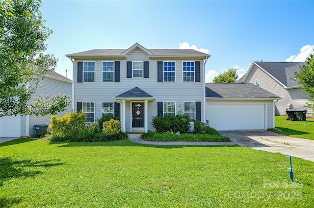 4075 Clover Rd NW, Concord, NC 28027 - colonial house featuring driveway, a front yard, and a garage
