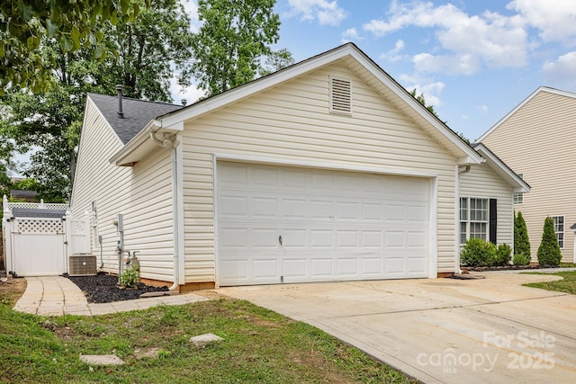 1776 Baylor Dr, Rock Hill, SC 29732 - view of side of property featuring a garage, concrete driveway, roof with shingles, a gate, and central AC