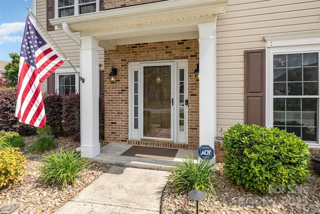 9593 Indian Beech Ave NW, Concord, NC 28027 - property entrance with brick siding