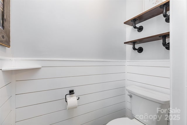 9593 Indian Beech Ave NW, Concord, NC 28027 - half bath featuring toilet and a wainscoted wall