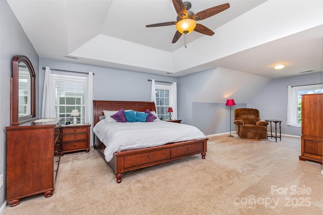 9593 Indian Beech Ave NW, Concord, NC 28027 - bedroom featuring carpet, baseboards, a tray ceiling, and a ceiling fan