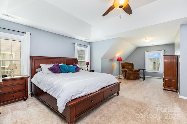 9593 Indian Beech Ave NW, Concord, NC 28027 - carpeted bedroom featuring multiple windows, a ceiling fan, baseboards, and vaulted ceiling