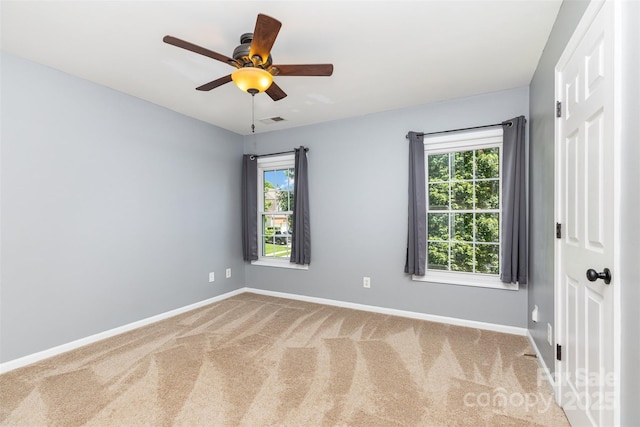 9593 Indian Beech Ave NW, Concord, NC 28027 - carpeted empty room featuring baseboards and ceiling fan