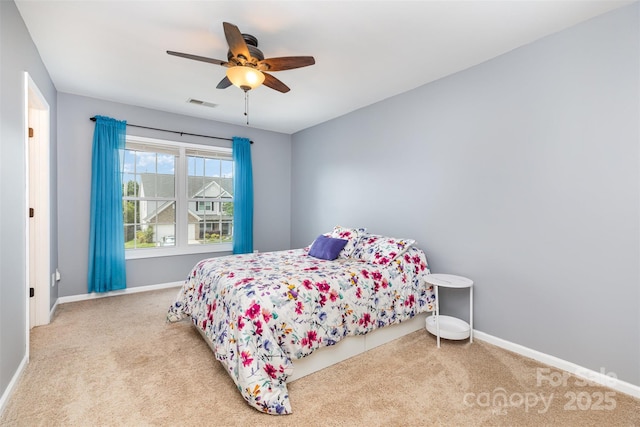 9593 Indian Beech Ave NW, Concord, NC 28027 - carpeted bedroom with baseboards and a ceiling fan