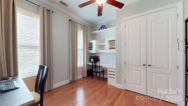 8605 Soaring Eagle Ln, Waxhaw, NC 28173 - office space featuring a ceiling fan, ornamental molding, light wood-type flooring, and baseboards