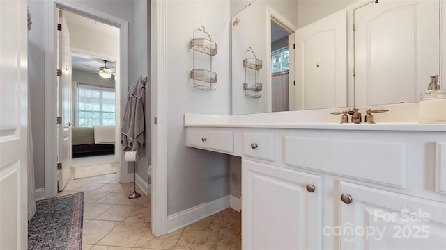8605 Soaring Eagle Ln, Waxhaw, NC 28173 - ensuite bathroom featuring a ceiling fan, baseboards, vanity, and tile patterned floors