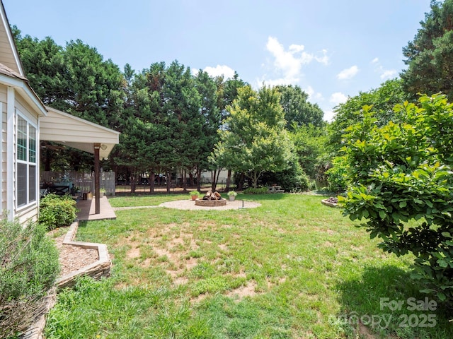 8605 Soaring Eagle Ln, Waxhaw, NC 28173 - view of green lawn featuring a fire pit