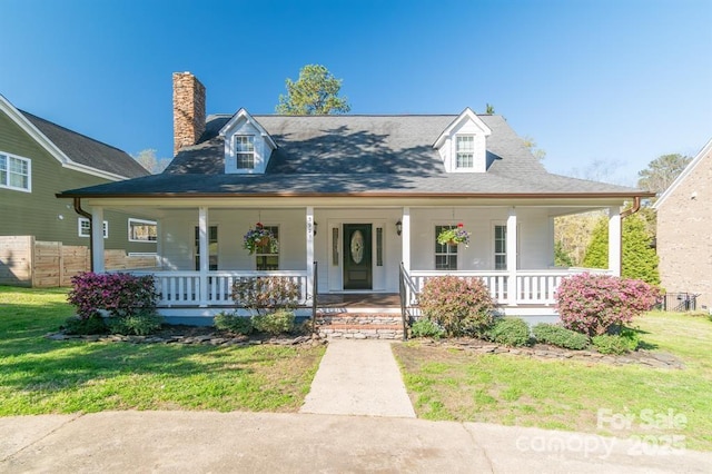 3921 Bon Rea Dr, Charlotte, NC 28226 - view of front of home with covered porch and a chimney
