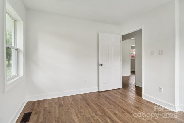 330 Willow Oak Cir, Lancaster, SC 29720 - unfurnished room with healthy amount of natural light, wood finished floors, and baseboards