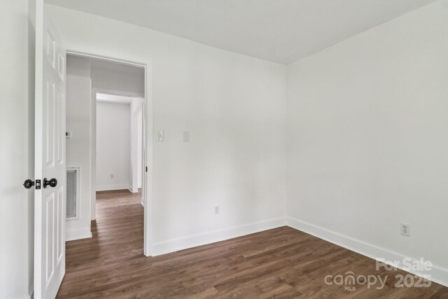 330 Willow Oak Cir, Lancaster, SC 29720 - empty room with dark wood-type flooring and baseboards