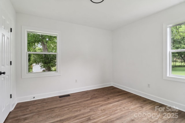 330 Willow Oak Cir, Lancaster, SC 29720 - spare room featuring wood finished floors and baseboards