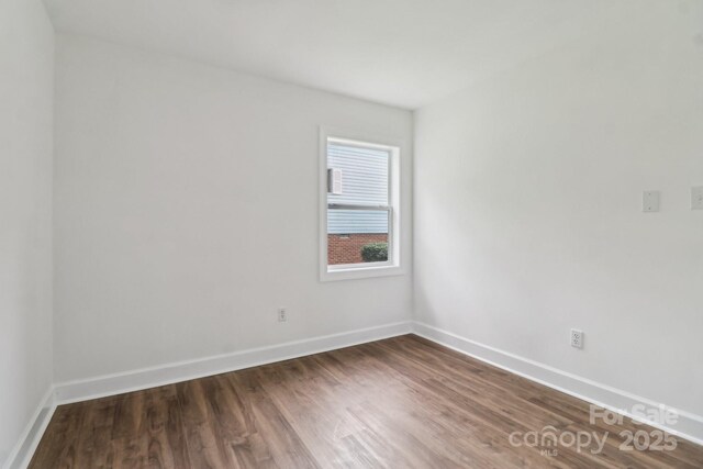 330 Willow Oak Cir, Lancaster, SC 29720 - unfurnished room with dark wood-style floors and baseboards