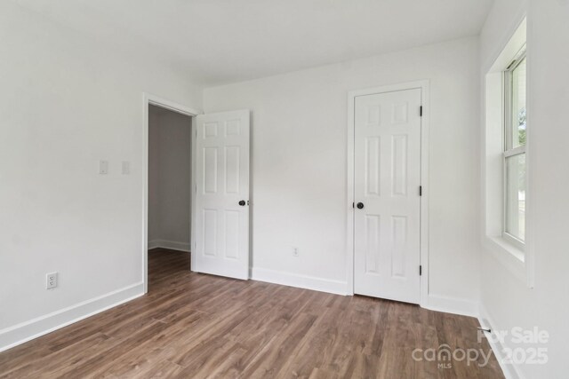 330 Willow Oak Cir, Lancaster, SC 29720 - unfurnished bedroom with wood finished floors and baseboards