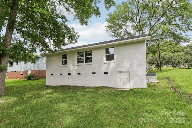 330 Willow Oak Cir, Lancaster, SC 29720 - rear view of property featuring a lawn, brick siding, and crawl space