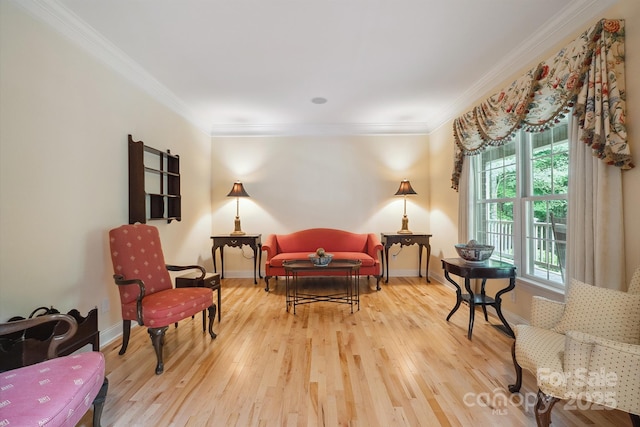 270 N St, Salisbury, NC 28147 - living area featuring wood finished floors, ornamental molding, and baseboards