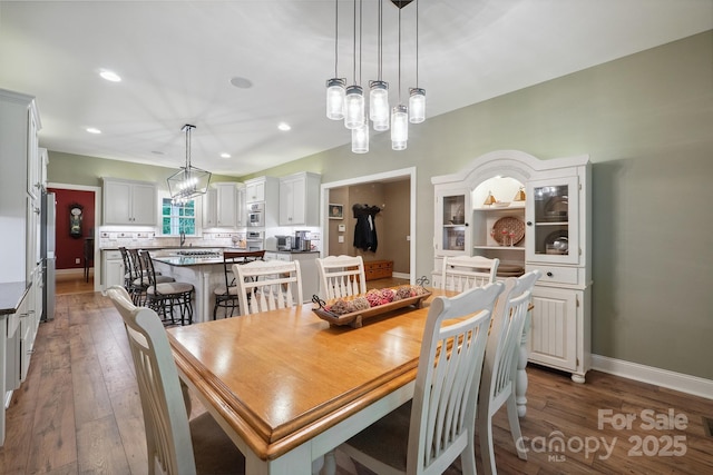 270 N St, Salisbury, NC 28147 - dining space featuring baseboards, a chandelier, wood-type flooring, and recessed lighting