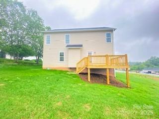 1872 Terrain Dr NW, Conover, NC 28613 - rear view of property with a wooden deck, a lawn, and stairs