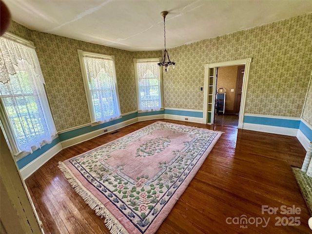 4689 Lakeview Acres Rd, Valdese, NC 28690 - dining space featuring wood finished floors and wallpapered walls