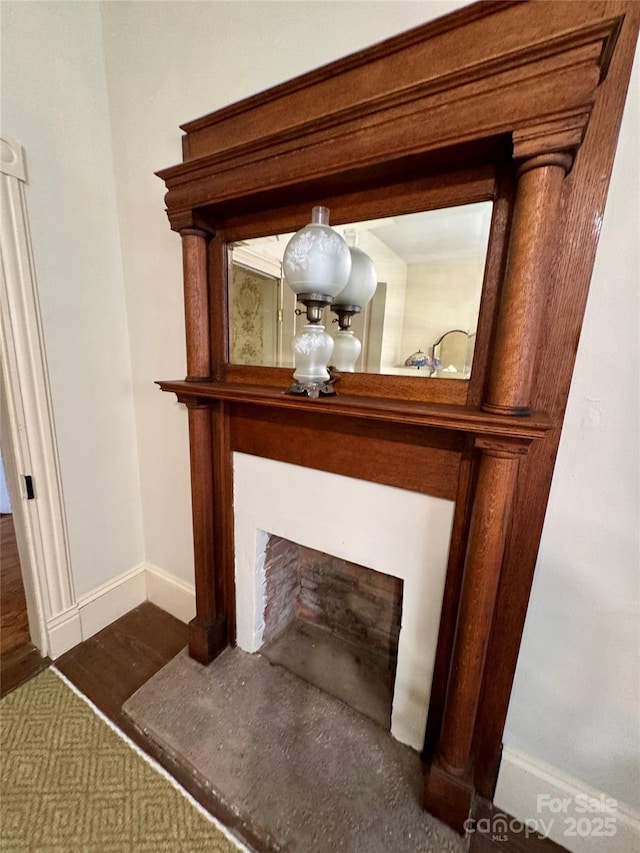 4689 Lakeview Acres Rd, Valdese, NC 28690 - detailed view of wood finished floors and a fireplace